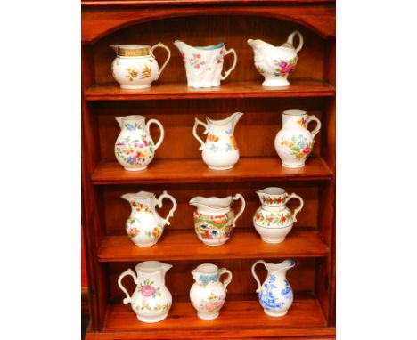 Various 20thC Royal Worcester silver shaped jugs, with certificates and display unit