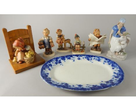 A Danish Copenhagen style B & G figure group, of girl beside a goat, on naturalistic base, predominantly in blue, grey and gr