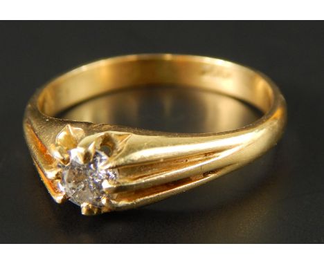 A diamond solitaire ring, with claw set diamond, yellow metal, marked 18ct, 4.5g all in. 