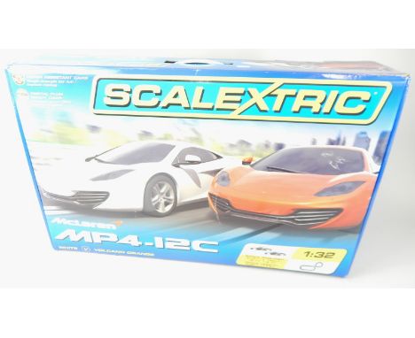 A Scalextric McLaren MP4-12C slot car set, with original box