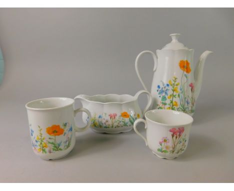 A large quantity of Feltmann Bavarian porcelain, tea and dinner ware, to include teapot, coffee pot, large platters, etc.