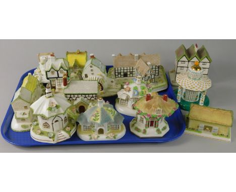 A large quantity of ceramic cottages, to include Coalport Shakespeare's Birthplace, Thatched Cottage, The Watermill, Six Chim