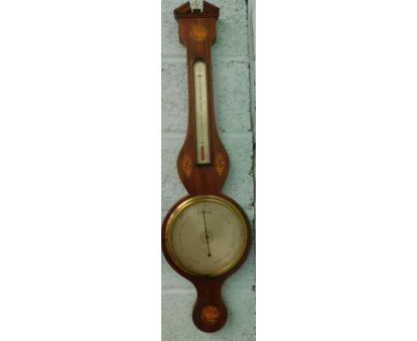 A mid 19thC mahogany wheel barometer, the silvered dial signed C Villa & Co Sheffield, the case inlaid with shells etc., 98cm