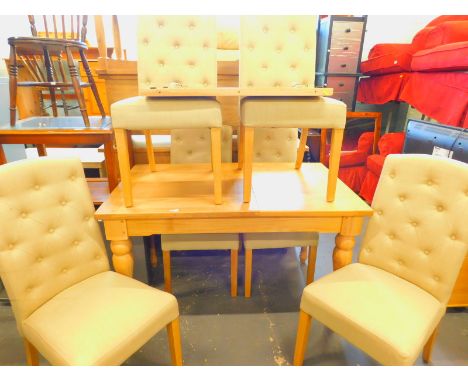 A modern Wills & Gambier light oak extending dining table, with one loose leaf on turned legs, and a set of six chairs, each 