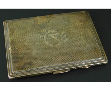 An Art Deco silver cigarette case, the engine turned case bearing initials PC, Birmingham 1937, 5¼ozs