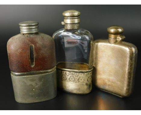 A Victorian silver and glass hip flask, with engraved decoration, (AF), London 1887, a silver plated hip flask and a pewter m