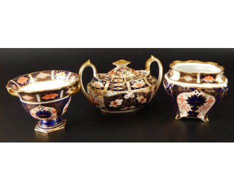 Three items of Royal Crown Derby porcelain, to include a two handled sugar bowl, a two handled small bowl and a tea caddy (la