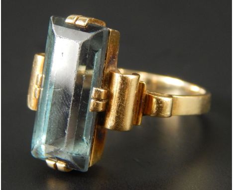 An Art Deco style dress ring, set with blue stone, yellow metal, marked 585,  4.6g all in. 