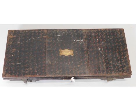 A 19thC painted tin military uniform trunk or case, the rectangular hinged lid with an associated plaque engraved Count Peter