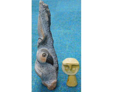 An African stone carving, indistinctly signed K. Zenda, depicting a parrot like bird, 41cm high and another African stone bus