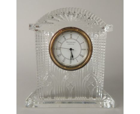 A Waterford crystal timepiece mantel clock, with 6cm diameter Roman numeric dial, 18cm high (boxed)