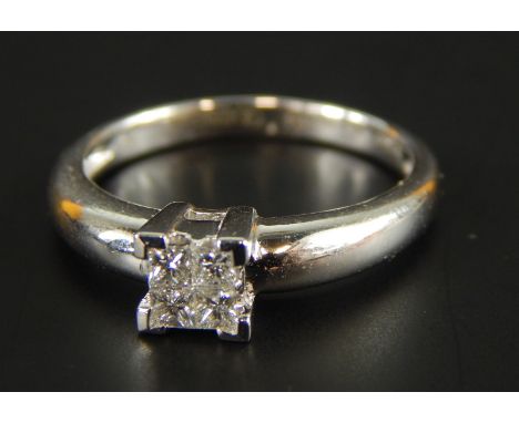 A 9ct white gold diamond dress ring, with four diamonds set to form a square, 2.5g all in. 