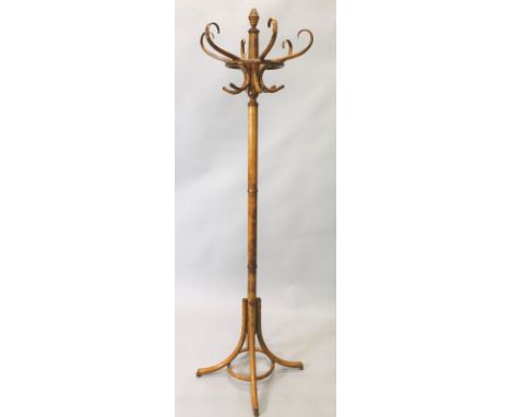 A stained beech and bentwood coat stand, 194cm high.