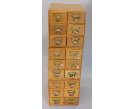 *Three retro style light oak office filing units, each with six drawers, and gilt brass handles.