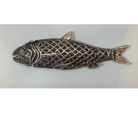 C18th Dutch Silver Fish Opium Container with scaled body decorated with filigree inserts, set ruby eyes, makers mark open han