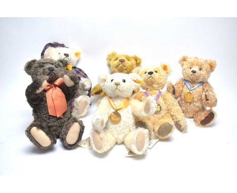 A collection of Steiff teddy bears, of various designs, including: ‘Winter Bear’ with tartan cap and scarf; Millennium Teddy 