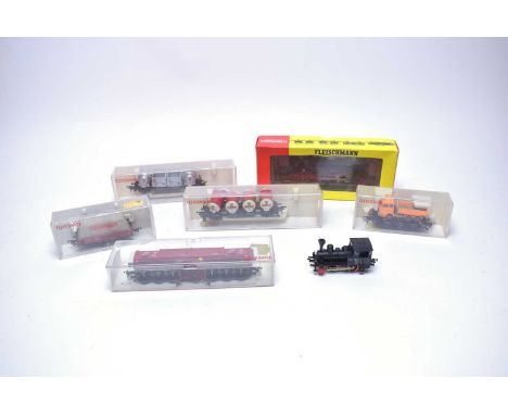 A selection of Fleischmann railway models, including: locomotive, in box; locomotive, unboxed; and five others, each in case.
