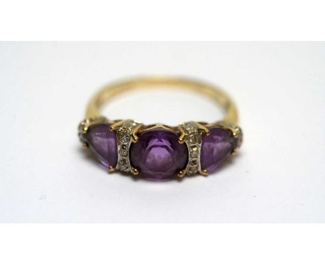 An amethyst and diamond dress ring, in 9ct yellow gold mount and shank, ring size R, 2.6g gross. 