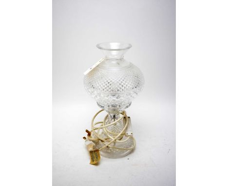 A Waterford Crystal table lamp, with crystal shade, wired for electricity, 35cms high.