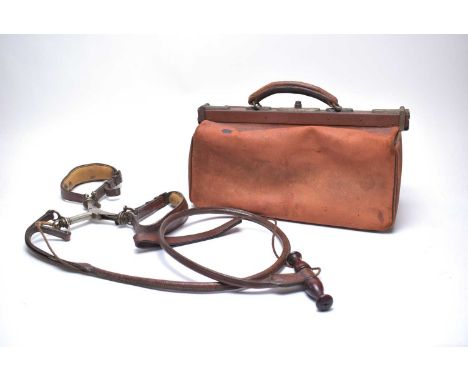 Collectibles, comprising: a leather greyhound coursing slip, with white metal mounts and turned wood handle; and a vintage do