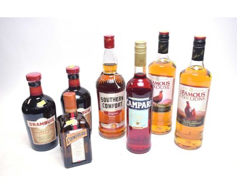 A selection of bottles of whisky and liqueurs, including: two bottles of The Famous Grouse Scotch Whisky, 1ltr; two bottles o
