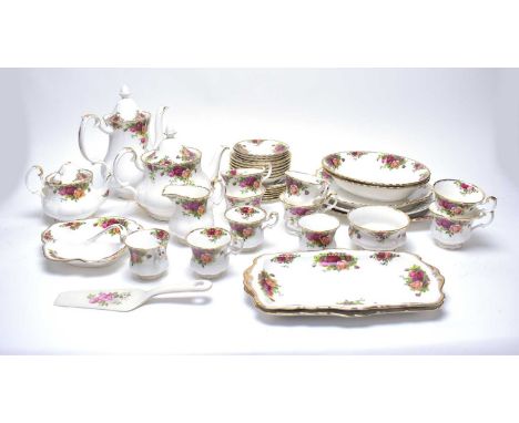 A Royal Albert ‘Old Country Roses’ pattern tea and coffee service, comprising six tea trios, four coffee cups and saucers, tw