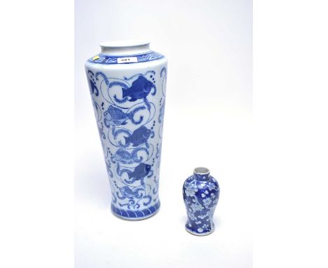 A Chinese blue and white vase, decorated with fish motif, 36cms high; together with a small Chinese blue and white vase, with