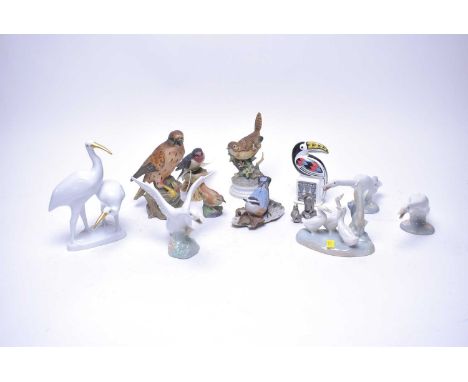 A selection of decorative animal figures, including: Wedgwood Noah’s Ark Collection toucan paperweight; three Lladro geese; N