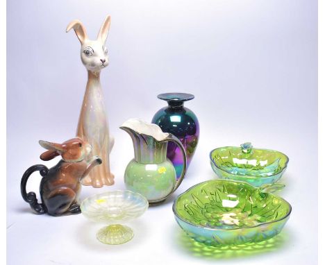 A collection of decorative lustrous ceramics and glass ware, including: Arthur Wood lustrous ceramic hare figure, 49cms high;