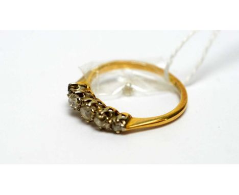 A five stone diamond ring, one stone loose but present, on 18ct yellow gold shank, ring size L.