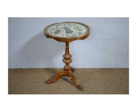 A Victorian walnut tripod table, the circular top with decalcomania chinoiserie design panel, on attractive well carved stem 