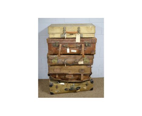 A vintage fitted leather trunk, with Hodges lock and canvas cover; a vintage 'Revelation' case, a vintage case by Cave &amp; 