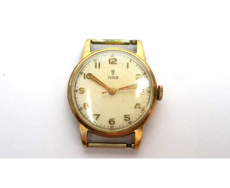 Tudor: a 9ct yellow gold cased wristwatch, the arabic dial fitted a manual wind movement, the case with engraved inscription 