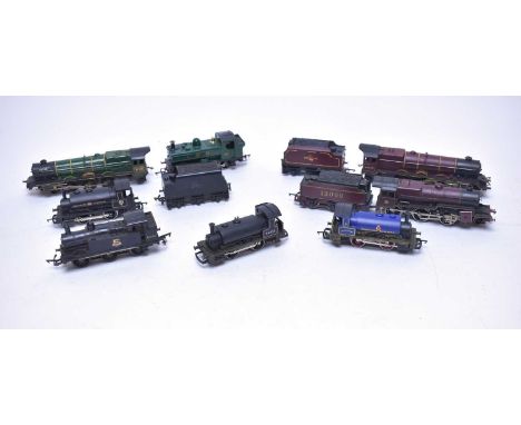 A selection of 00-gauge model railway locomotives, by makers including Lima, Tri-ang and Hornby, each unboxed.