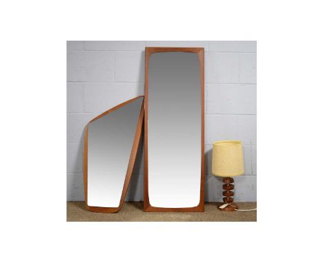 A mid-Century Danish teak wall mirror of abstract design, with bevelled plate, 87 x 41cms, stamped 'Made In Denmark' to rever