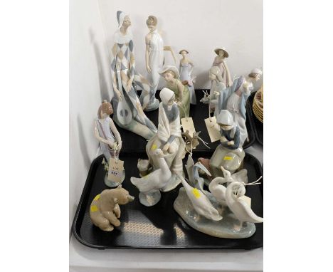 A collection of Lladro figures of girls, including: ‘Spring Dance’; Art Deco girl ‘The Flirt’ and others; together with ceram