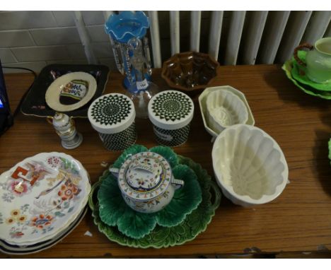 A mixed lot of glass and ceramics to include lustre vase, Mary Gregory style decanter, various jelly moulds, Poole pottery st