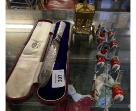 A mother of pearl handled and silver bladed presentation knife together with Queens coronation diecast model state coach (2) 