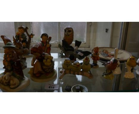 A collection of various Goebal & Hummel models of children, birds, squirrel, decorative plates and other items 