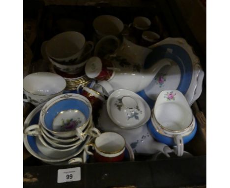 A quantity of blue and floral decorated Old Royal tea ware, a quantity of Royal Doulton Burgundy tea wares and a quantity of 