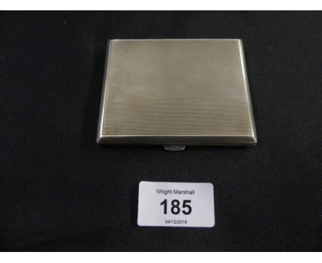 A silver cigarette case of hinged rectangular form, decorated with engine turned detail, London hallmarked, approx 3.2oz 