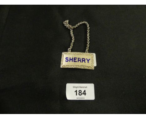A silver and blue enamel decanter label marked 'Sherry' bearing Birmingham hallmarks 