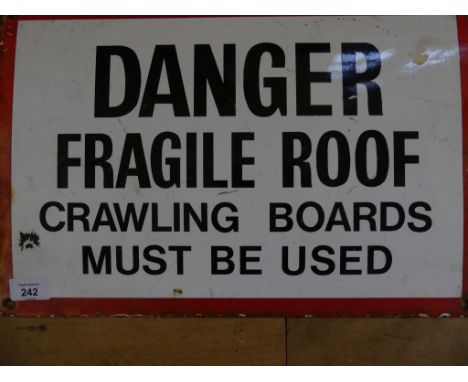 A vintage enamel warning sign Danger Fragile Roof 
