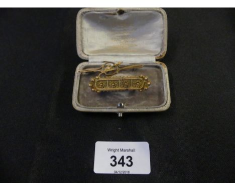 Two bar brooches to include a late 19th Century cannetrile bar brooch together with early 20th Century split pearl bar brooch