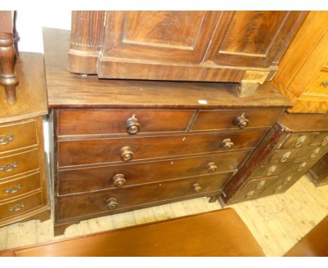 A 19th Century mahogany chest of two short and three long drawers with turned knob handles, raised on bracket feet. 