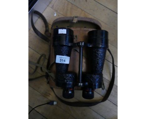 A pair of cased vintage binoculars 
