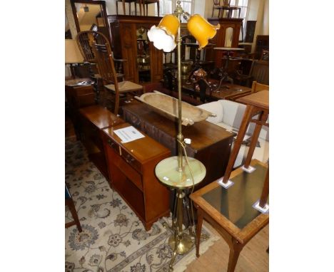 A brass and onyx three light standard lamp in the Art Nouveau style 