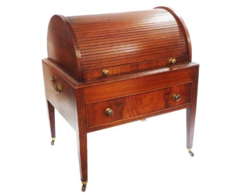 A 52cm modern mahogany cellarette style roll-top drinks cabinet with folding shelf enclosed by a tambour, set on square taper
