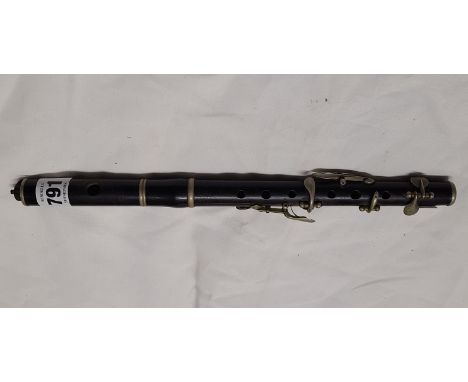 A late 19th Century ebonised wood piccolo with plated fittings retailed by the Army &amp; Navy stores - a/f to terminal