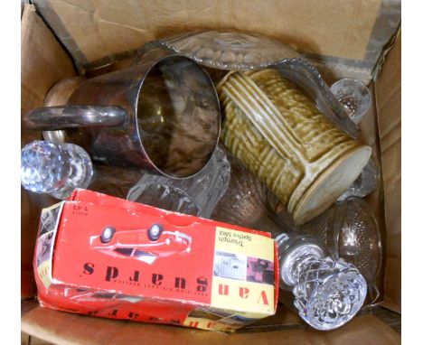 A box containing a quantity of glassware and collectable items including decanters, boxed toy car, etc.